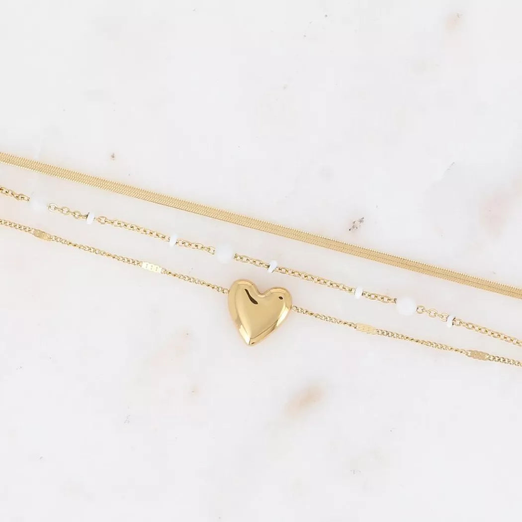 Bracelet 3 rangs -pierres naturelles blanches, pendentif coeur doré