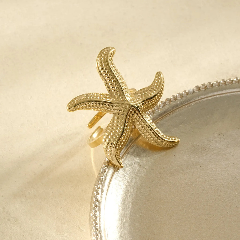 Bague dorée étoile de mer taille grande