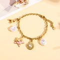 Bracelet doré étoile de mer en émail et perles baroques