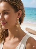 Boucles d’oreilles dorées étoile de mer, hippocampe et perles