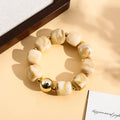 Bracelet perles carrées - blanc marbré - élastique