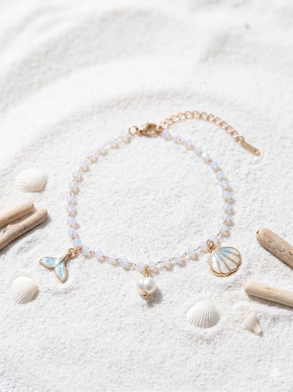 Chaîne de cheville dorée à perles, coquillage et queue de sirène