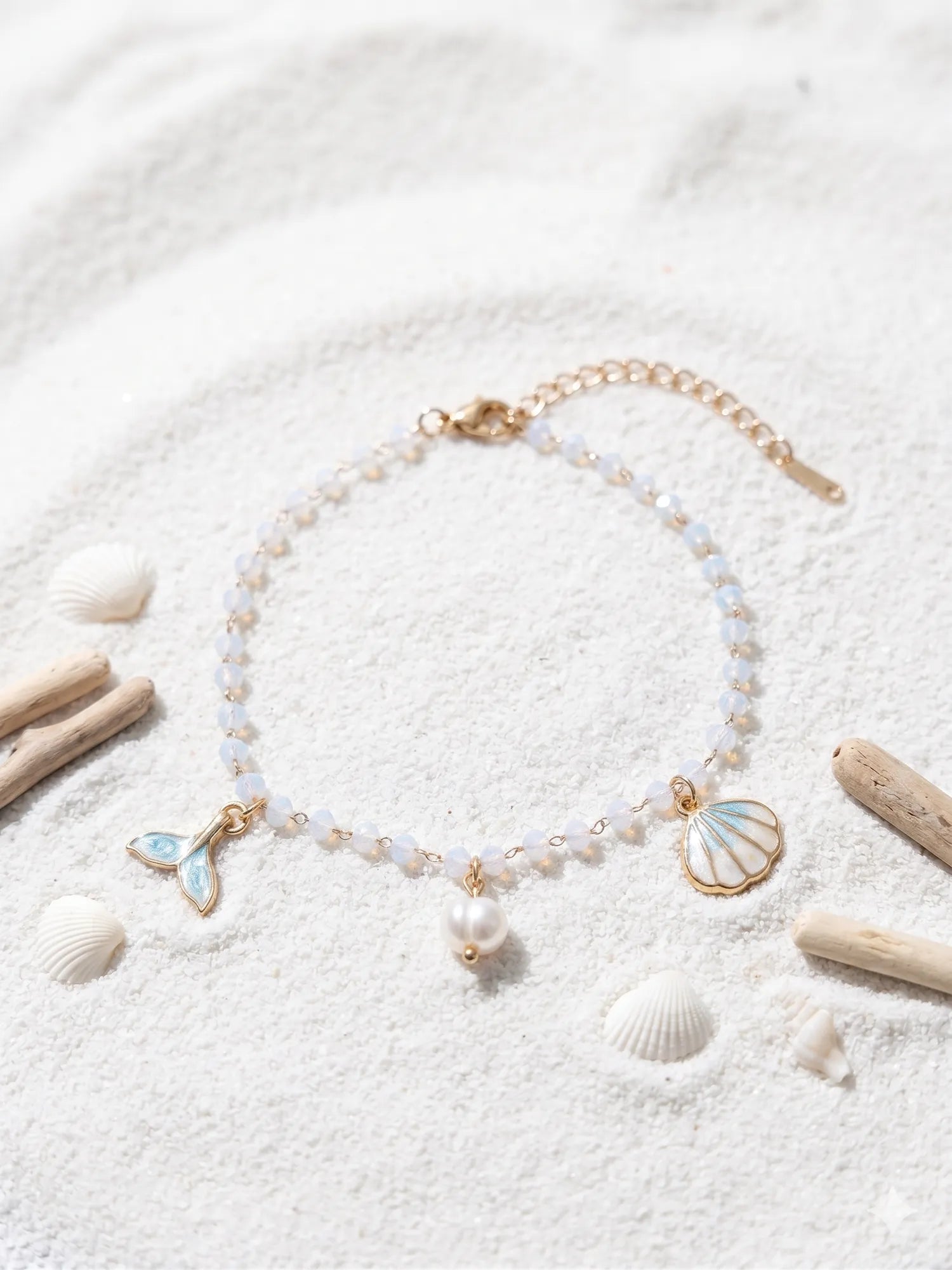 Chaîne de cheville dorée à perles, coquillage et queue de sirène